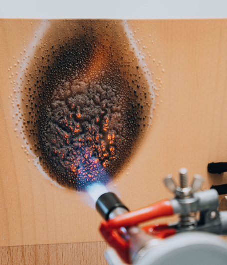 In the case of a fire, the coating forms a foam which creates an insulating barrier over the wood. | © ADLER
