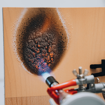 In the case of a fire, the coating forms a foam which creates an insulating barrier over the wood. | © ADLER