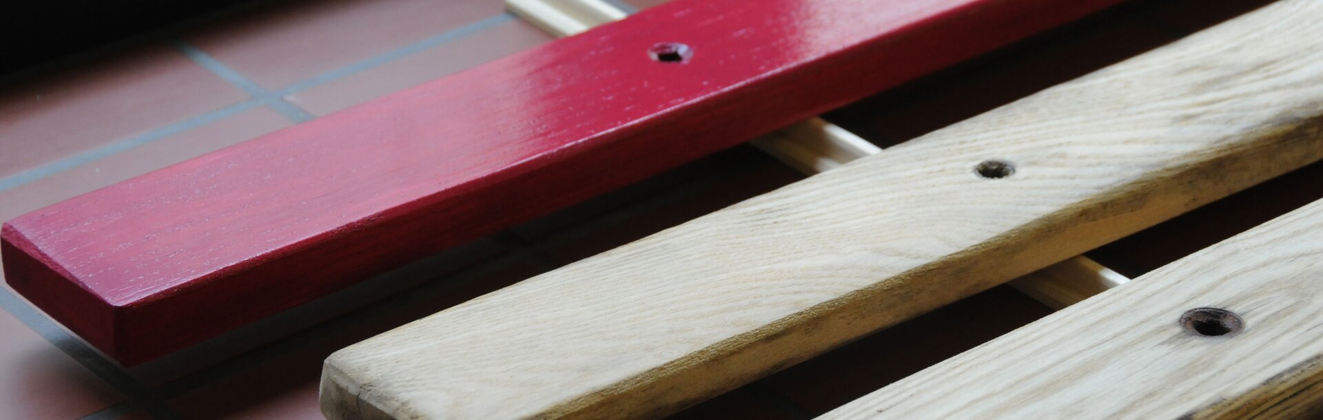 Painting A Garden Bench Made Of Wood And Metal