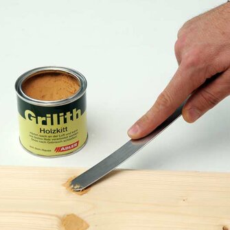 Step 1: Simply press in the wood filler into the flawed location using a filler for this purpose 