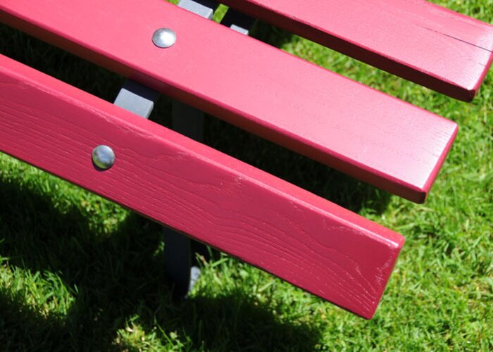 Painting A Garden Bench Made Of Wood And Metal